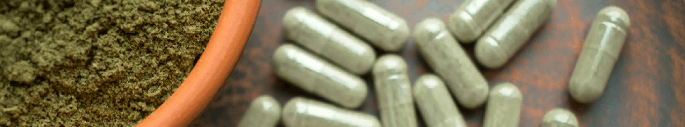 kratom pills on table