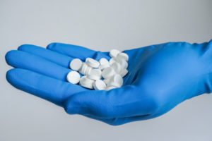 Gloved hand full of suboxone