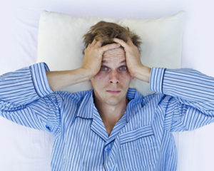 man-with-dark-circles-cannot-sleep-in-bed-from-meth-use-1