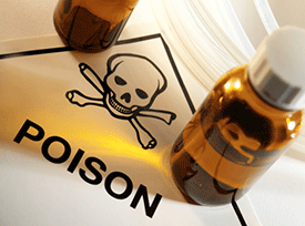 Bottles of poison on top of a skull and crossbones label